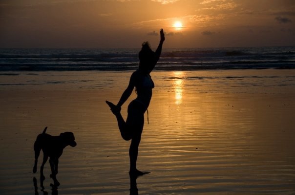 Silhouette on beach at sunset